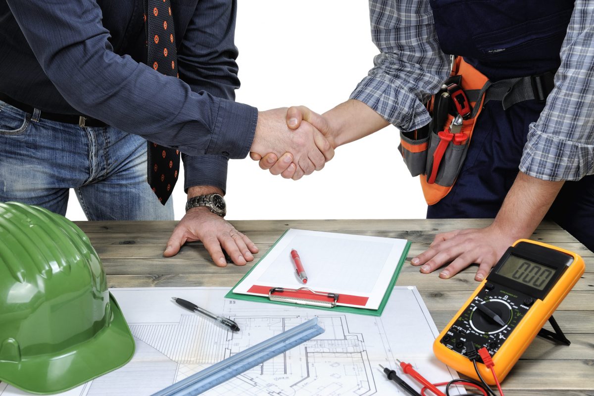 Engineer,And,Technician,Shake,Hands,Over,A,Project,Of,A